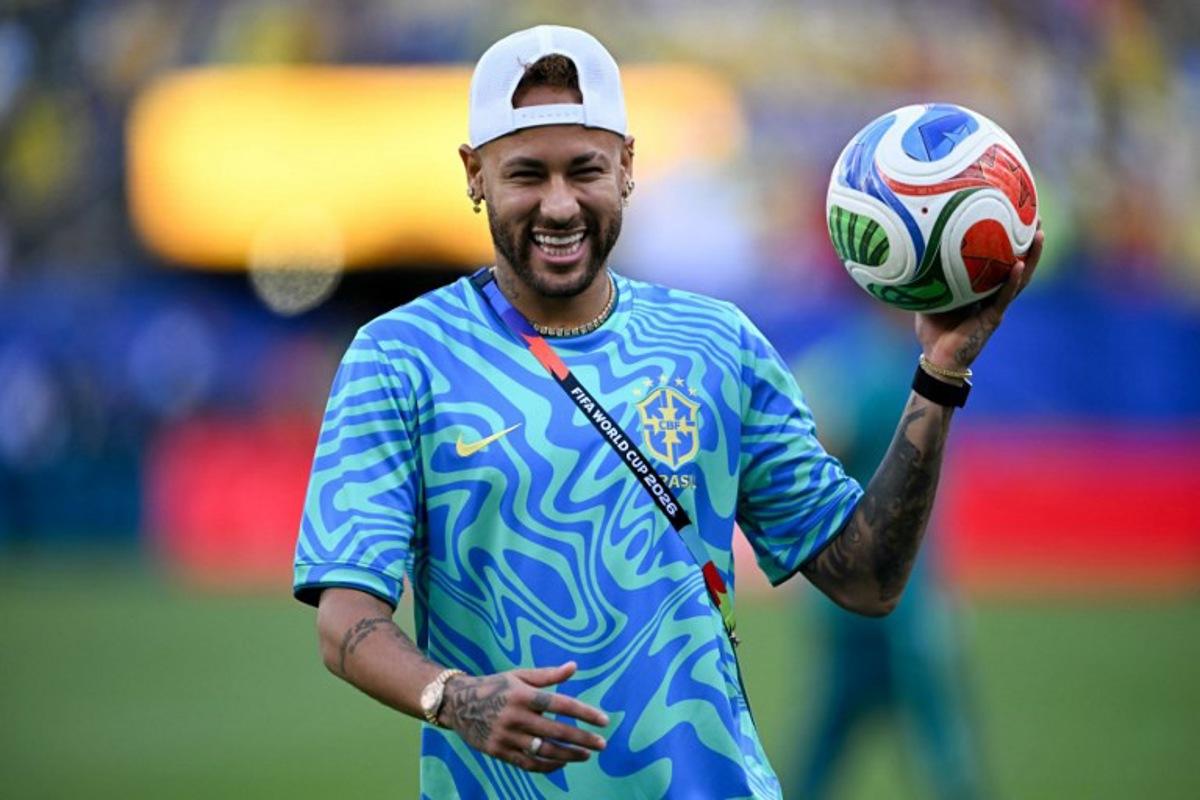 Brazil's forward #10 Neymar gestures during a warm up ahead of the 2026 World Cup Group C football match between Brazil and Morocco at the New York/New Jersey Stadium in East Rutherford on June 13, 2026. Mauro PIMENTEL / AFP