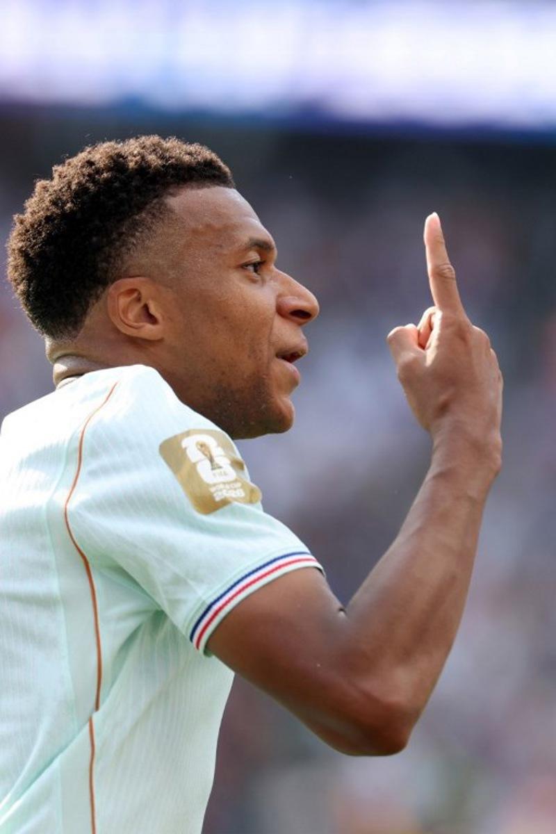 France's forward #10 Kylian Mbappe celebrates scoring his team's first goal during the 2026 World Cup football tournament quarter-final match between France and Morocco at Boston Stadium in Foxborough on July 9, 2026. Odd ANDERSEN / AFP