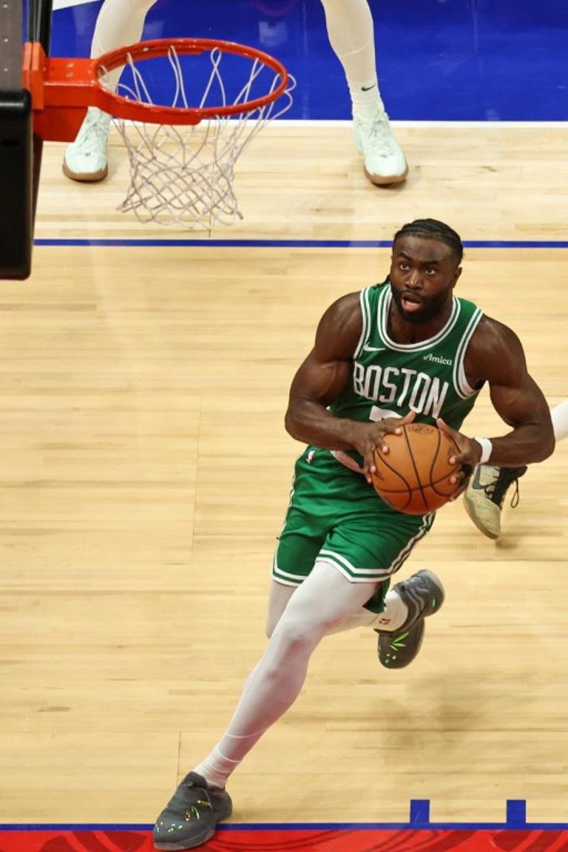 Boston Celtics' forward #07 Jaylen Brown jumps to shoot during the NBA Preseason game between the Boston Celtics and the Denver Nuggets at the Etihad Arena in Abu Dhabi on October 6, 2024. Fadel Senna / AFP
