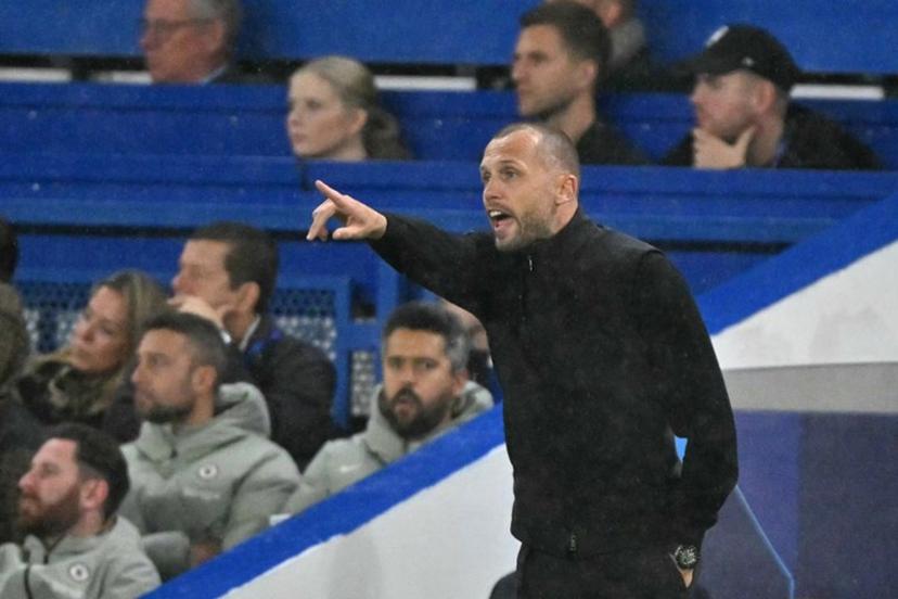 Ajax's Dutch head coach John Heitinga gestures from the touchline during the UEFA Champions League league-phase football match between Chelsea and Ajax at Stamford Bridge in London on October 22, 2025. Glyn KIRK / AFP
