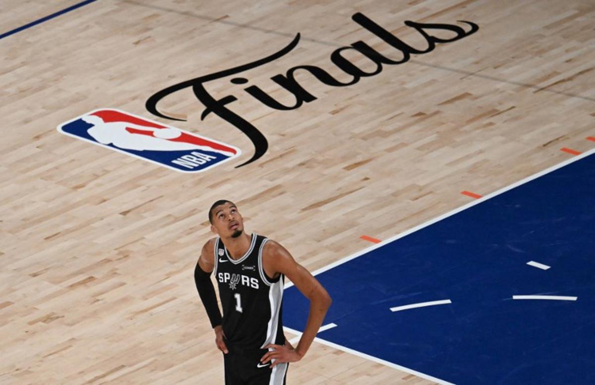 San Antonio Spurs' French forward-center #01 Victor Wembanyama looks up during Game Three of the NBA Finals between the San Antonio Spurs and the New York Knicks at Madison Square Garden in New York on June 8, 2026. SAUL LOEB / AFP