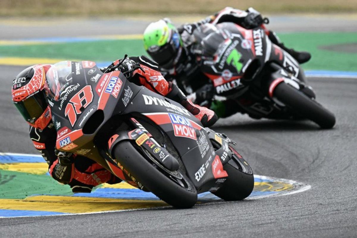 Liqui Moly Dynavolt Itact GP team's Spanish Moto2 rider Manuel Gonzalez, first placed rides ahead of Fantic Racing Lino Sonego team's Belgian Moto2 rider Barry Baltus second placed in the France Moto2 race at the Le Mans Circuit on May 11, 2025. LOIC VENANCE / AFP