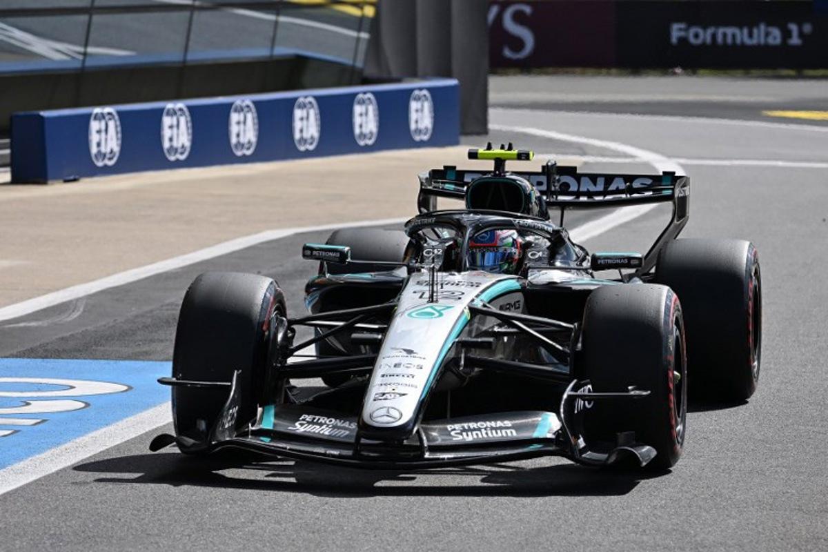 Mercedes' Italian driver Kimi Antonelli drives down pit lane during the qualifying session ahead of the Formula One British Grand Prix at the Silverstone motor racing circuit in Silverstone, central England, on July 4, 2026. PETER POWELL / POOL / AFP
